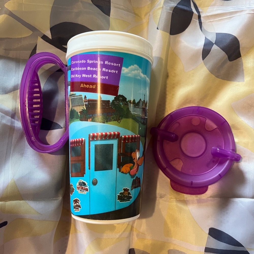 SELLING DISNEY PARKS TRAVEL COLLECTORS CUP COLOR PURPLE And BLUE GOOD CONDITION.